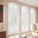 Arched plantation shutter