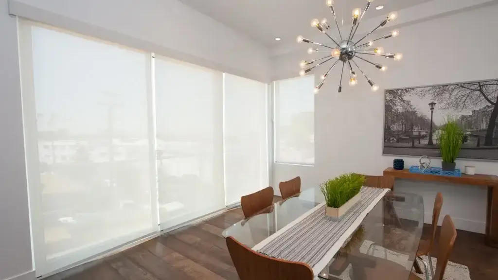 Motorized roller shades